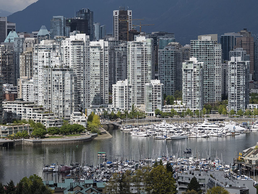 A high angle view of Vancouver's False Creek and the crowded downtown skyline, Vancouver, B.C., May 4, 2015. Bayne Stanley/CP